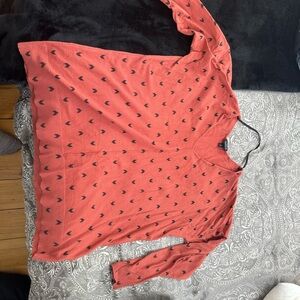 Torrid Coral V-Neck Top with Black Heart Pattern